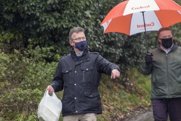 Jeremy delivers a meal to a local resident